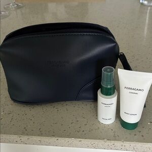 Salvatore Ferragamo Dark Blue Toiletry Bag with lotion & facial mist. Brand new